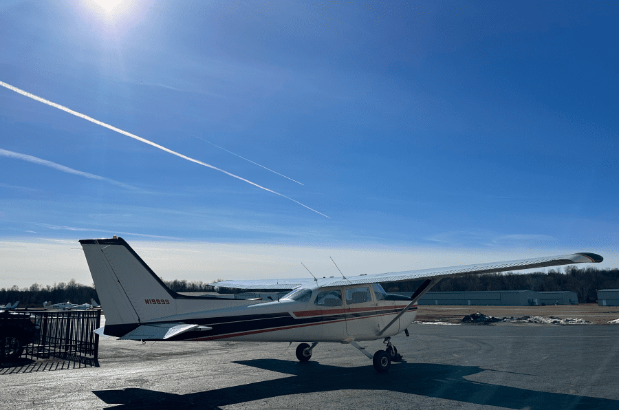 g1 A small airplane sitting on top of an airport runway.