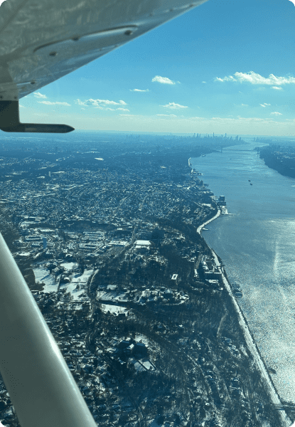 A view of the ocean from an airplane window.